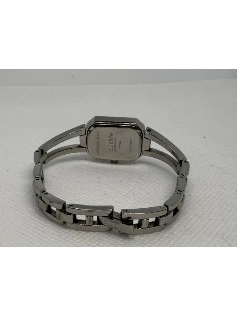 Guess Women's Silver-Tone Crystal Accented Rectangular Bracelet Watch